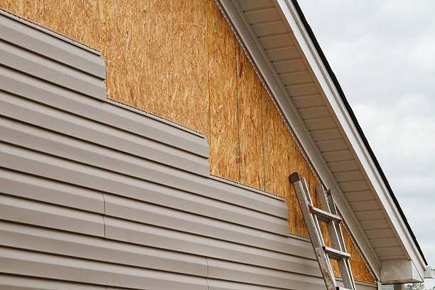 Professional Storm Damage Siding Repair technician working in Carnation, WA